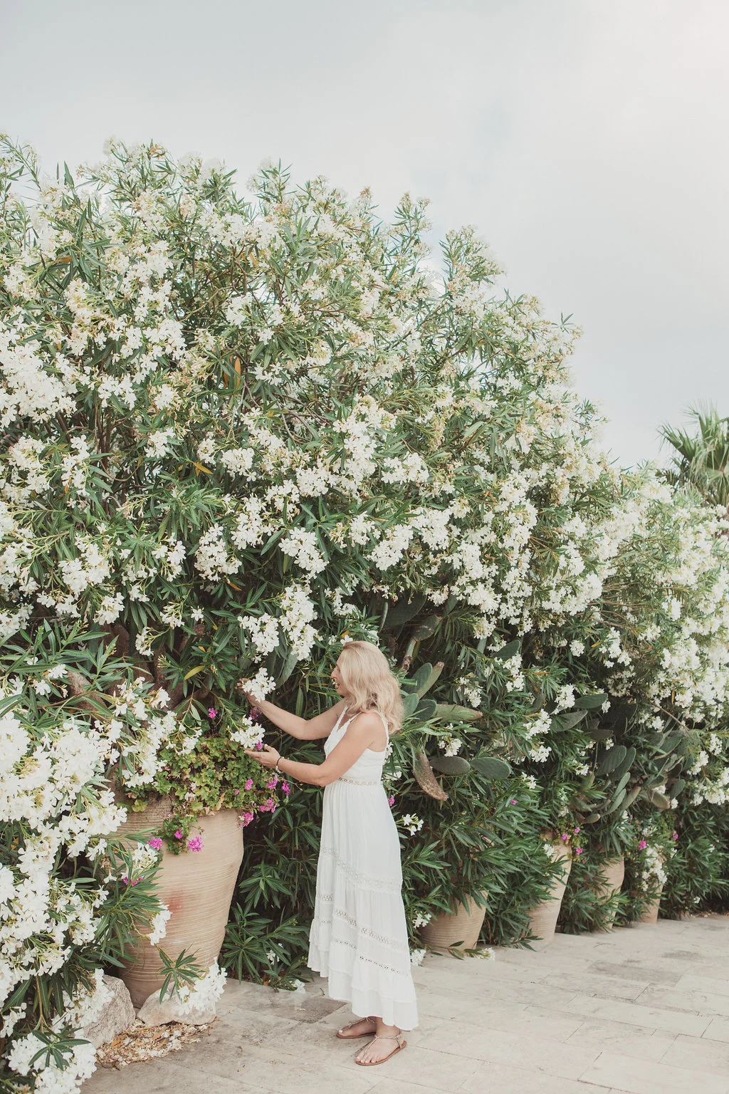 Mary at the villa (this flower wall was my favorite spot!)