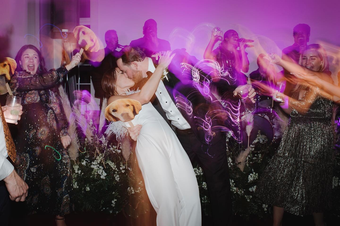 If only you knew the sheer talent and luck that went into capturing this image. A fast-paced, twirl-heavy dance with Lindsey and her friend, ending with a spin send off over to her new husband, Dan, who caught, dipped and kissed her WHILE holding ont