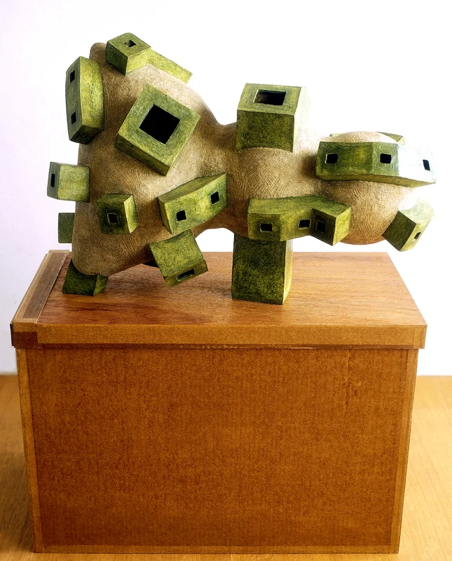Untitled 2001 - 2003, newspaper, leaflets, inorganic household waste, wax. 45 x 67 x 36 cm. (ex. box/pedestal). Photo: W.Vermaase.