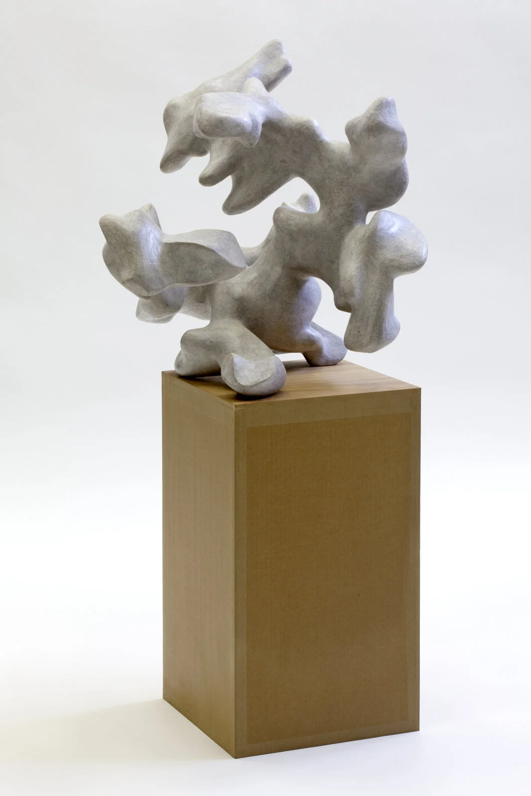 Untitled 2013 - 2015, Newspaper, reused printerpaper, inorganic household waste, votive candle residue. 116 x 54 x 53 cm. (incl. pedestal) Photo: W. Vermaase