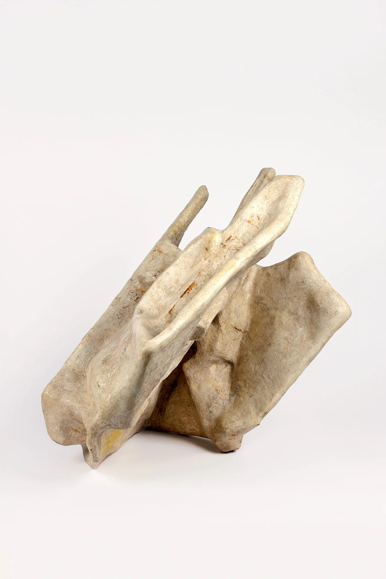 Untitled 2025. Newspaper, reused paper, inorganic household waste, chalk residue, votive candle residue. 64 x 68 x 52 cm. Photo: Aad Hoogendoorn.
