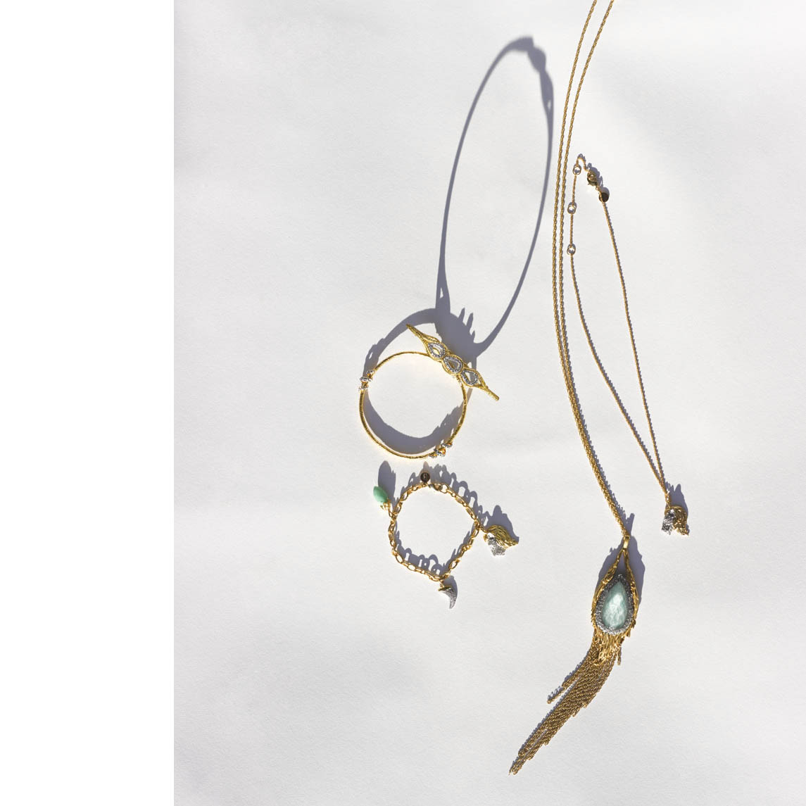 Thinking about shadows and how they are an art unto themselves, just a moment behind the primary object of focus. Jewelry by Alexis Bittar.