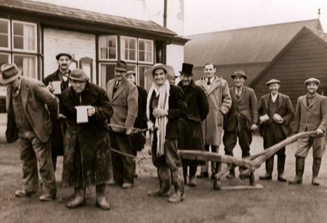 Plough boys outside The Bell in 1953