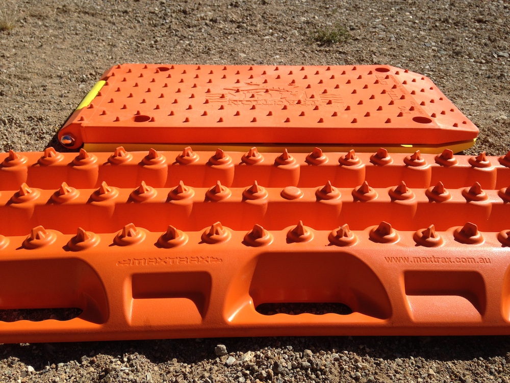Even folded, the Traction Jack is thinner than a MaxTrax.