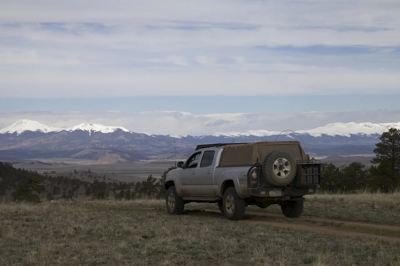Ross Blair's Tacoma against the Colorado skyline.