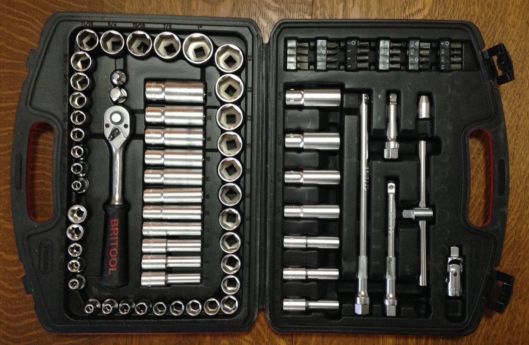 A superbly comprehensive and compact socket set from Britool, including standard and deep SAE and metric sockets, a sliding T handle, extensions, a universal joint (lower left), plus screw, torx, and hex fittings with an adapter. Sadly no longer made; the newer Britool products have diminished in quality.