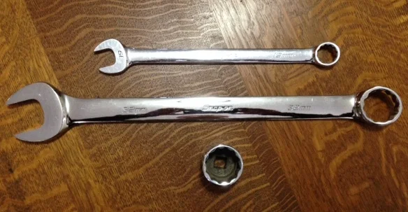 A 19mm wrench compared to the 32mm. For most needs the 32mm socket will suffice.