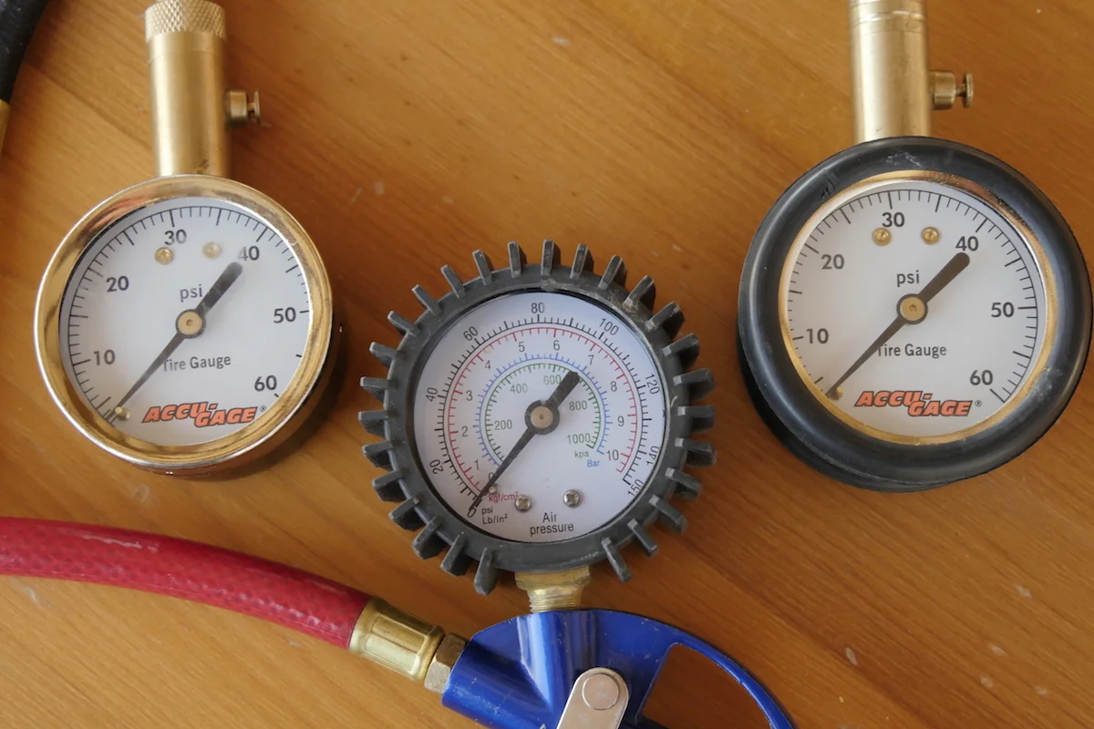 The offending gauge, middle, along with two accurate Accu-Gauges.