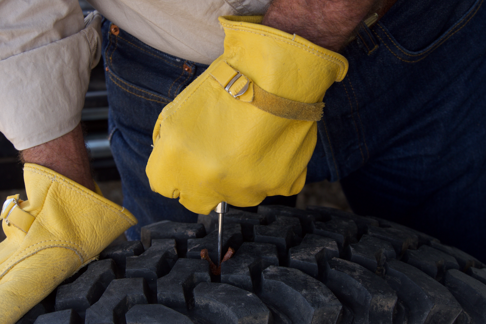 Push the plug in until the ends stand just clear of the tread.