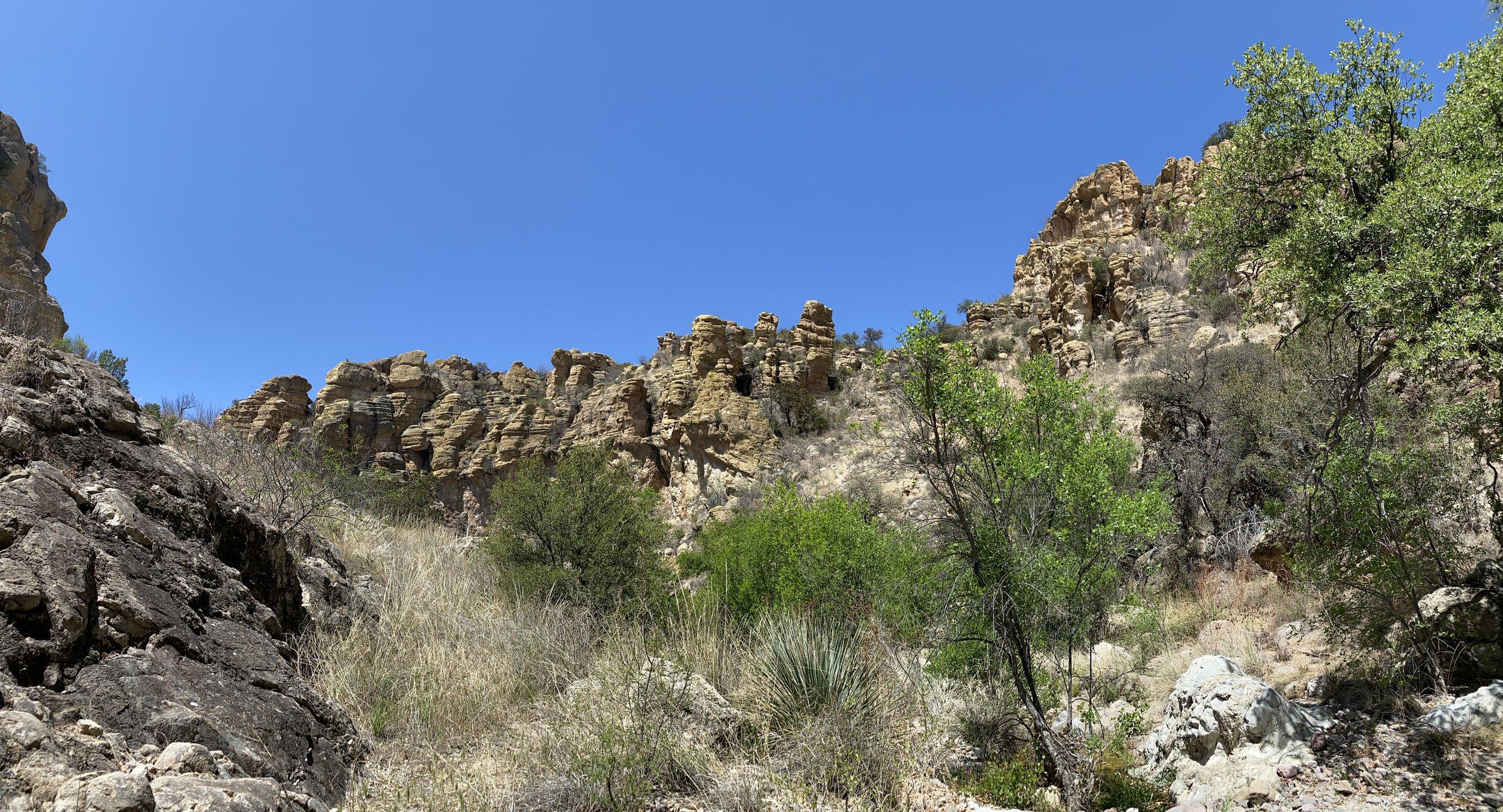 The yellow ochre cliffs overlooking the shrine.