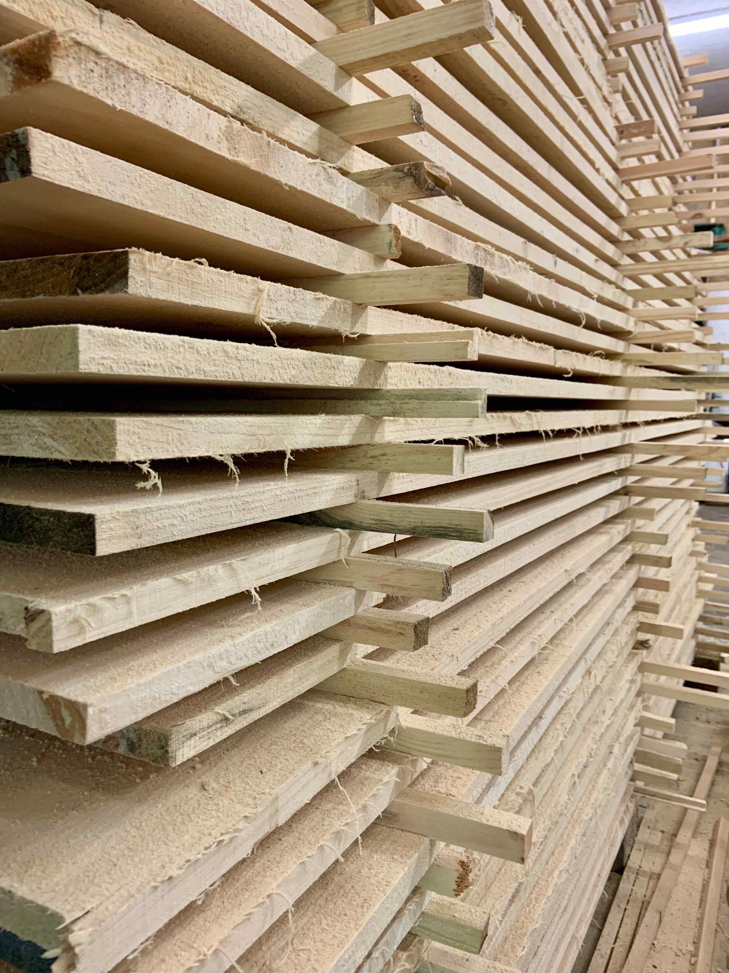 Stickers stacked between shiplap to help dry the lumber.