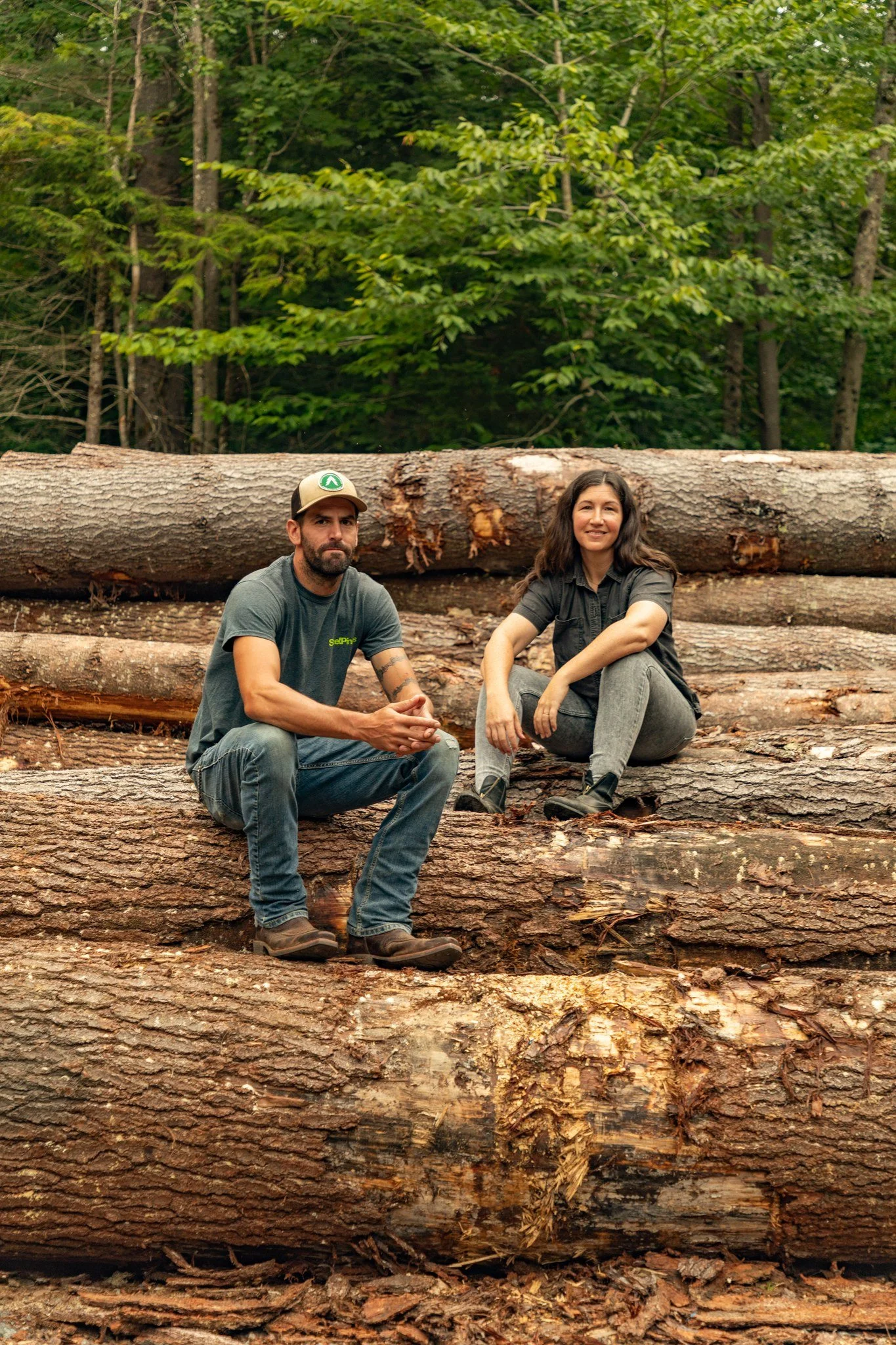 Mark and Darcie Burroughs, owners of Steel Pines, in the woods in Edinburg, NY