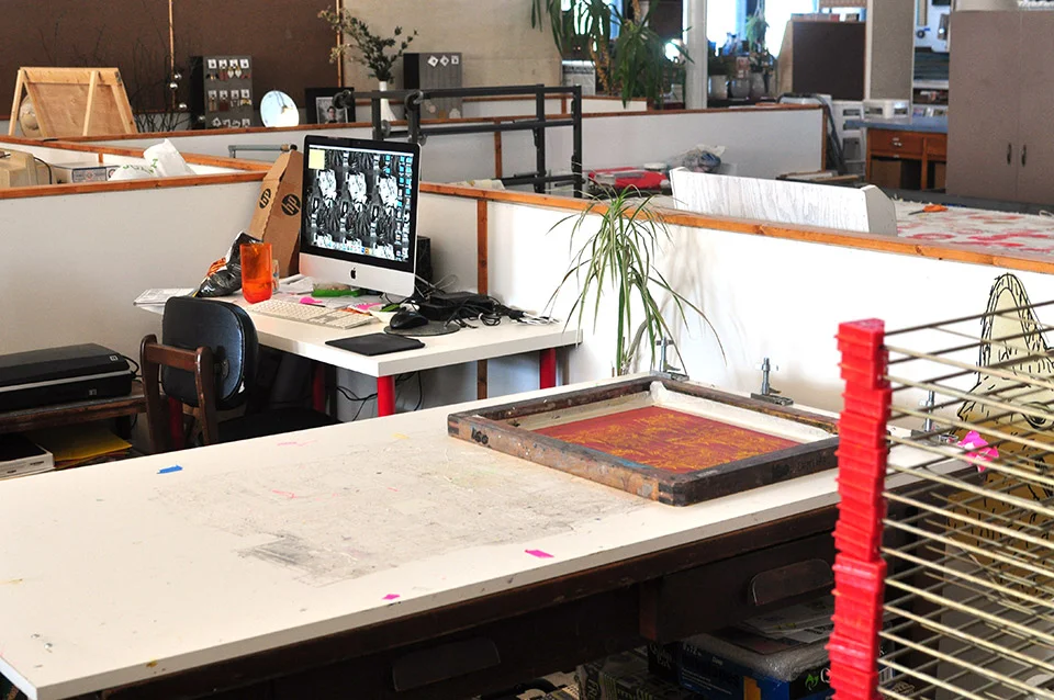 My desk, printing table, and drying rack at my studio in POST.
