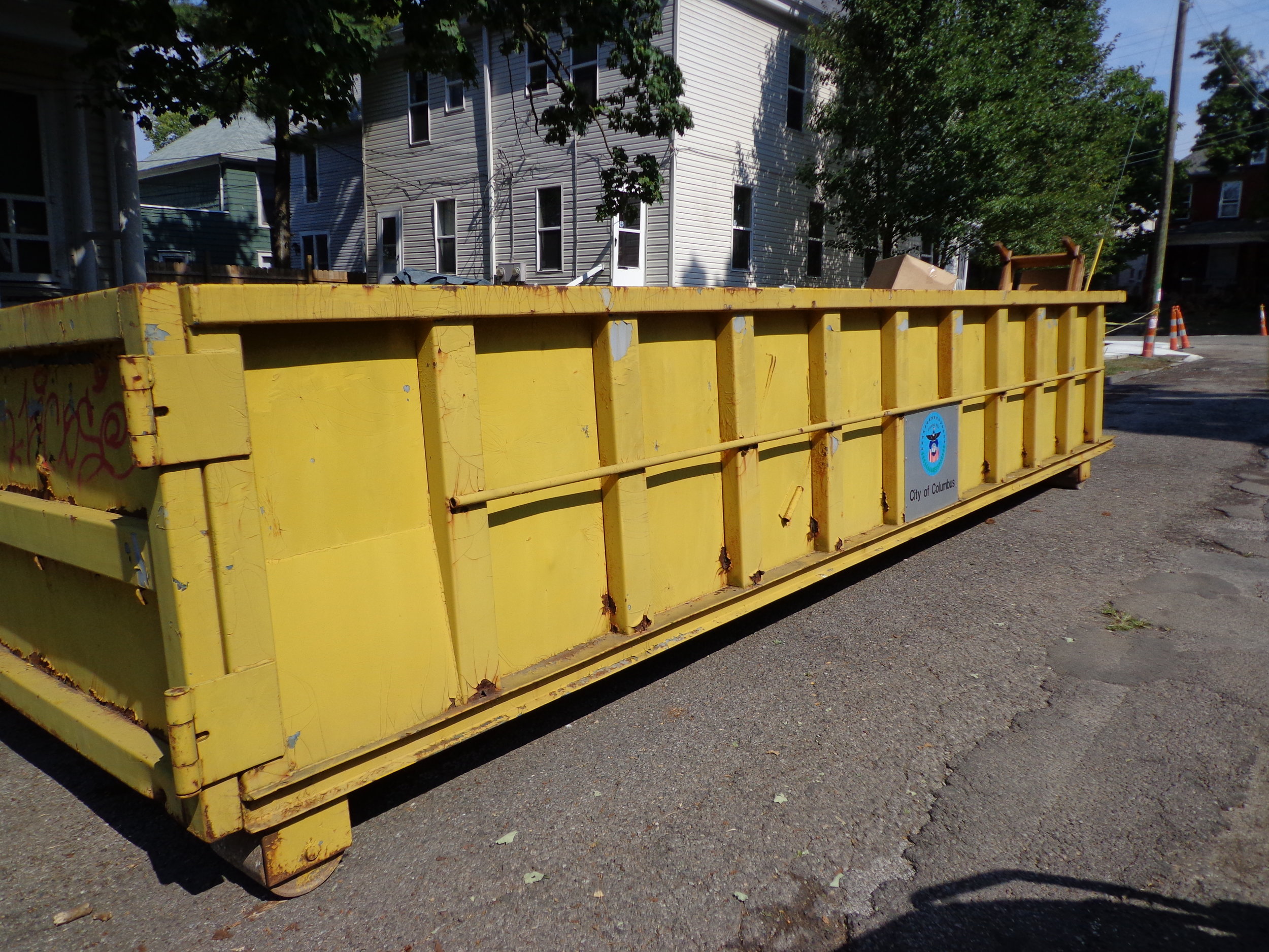 Large marked on-street containers marked specifically for furniture