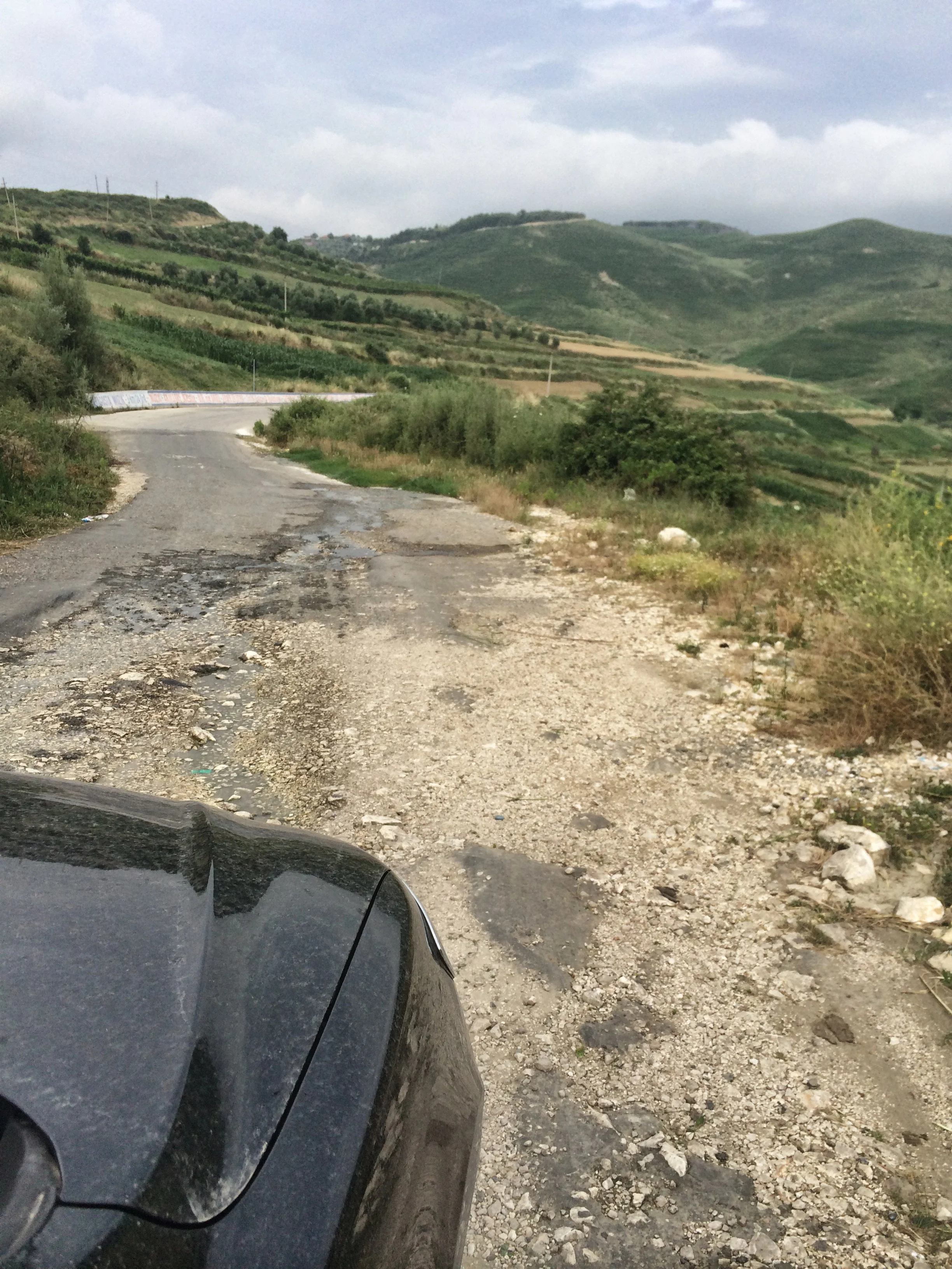 Yes, this is the same road! A bit of touching up needed. And car is now looking suitably dirty as well.