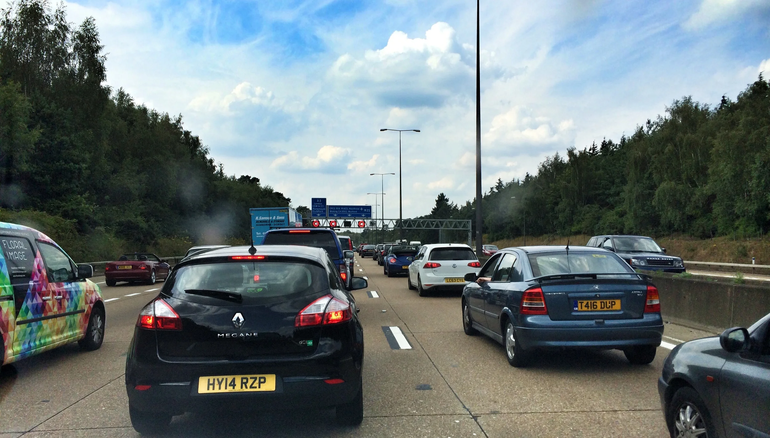 The M25. Stopped. Going nowhere. And on cracked ribbed concrete.