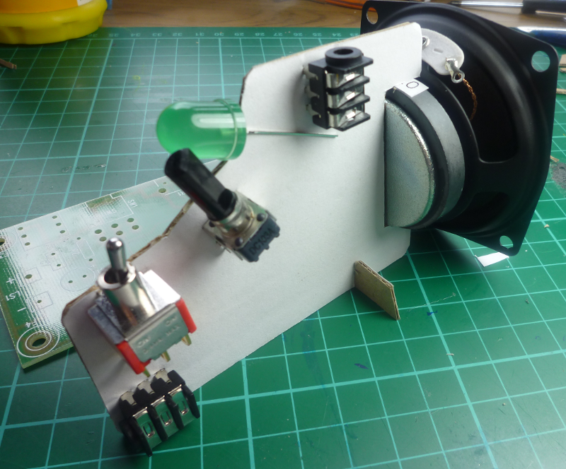 Speaker and UI components mounted. It was clear that the speaker needed better mounting to hold it in place more firmly. Also, the sides of the speaker are not straight, so it doesn’t provide great support.