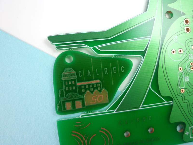 The token can be easily broken off the board and attached to a keyring or anything else ;)