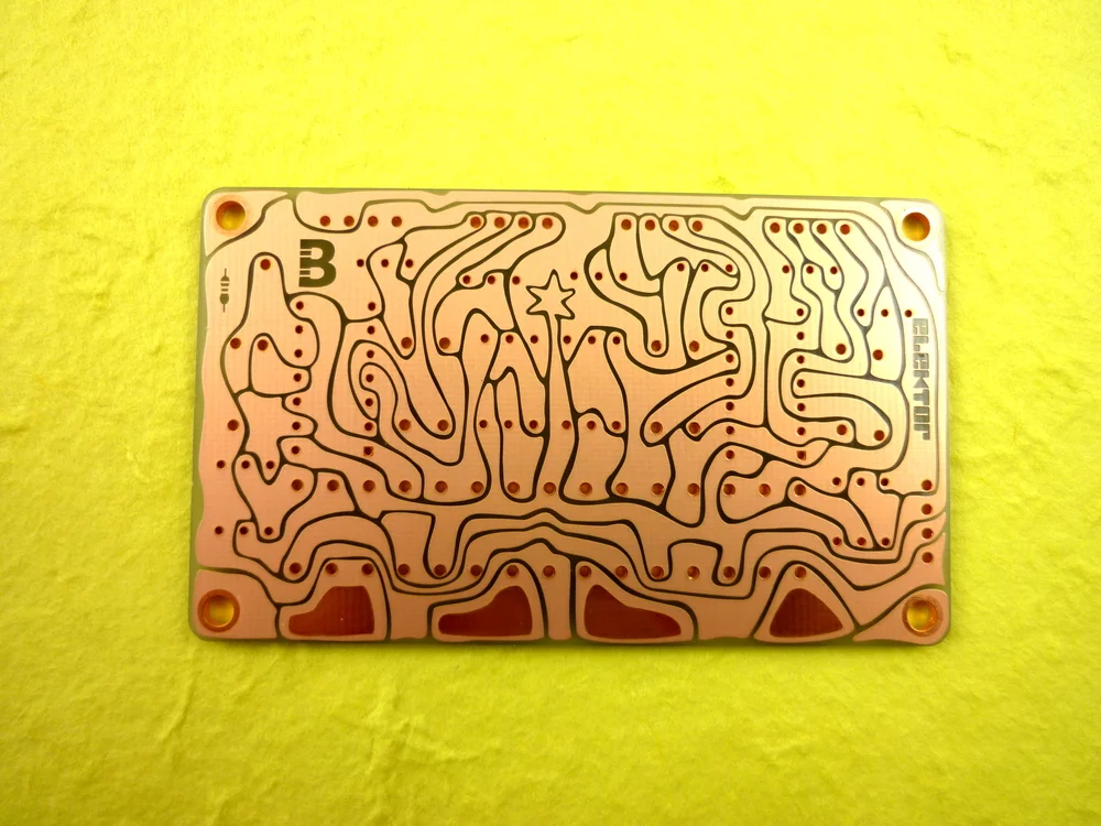 The first board with the solder polarity symbol
