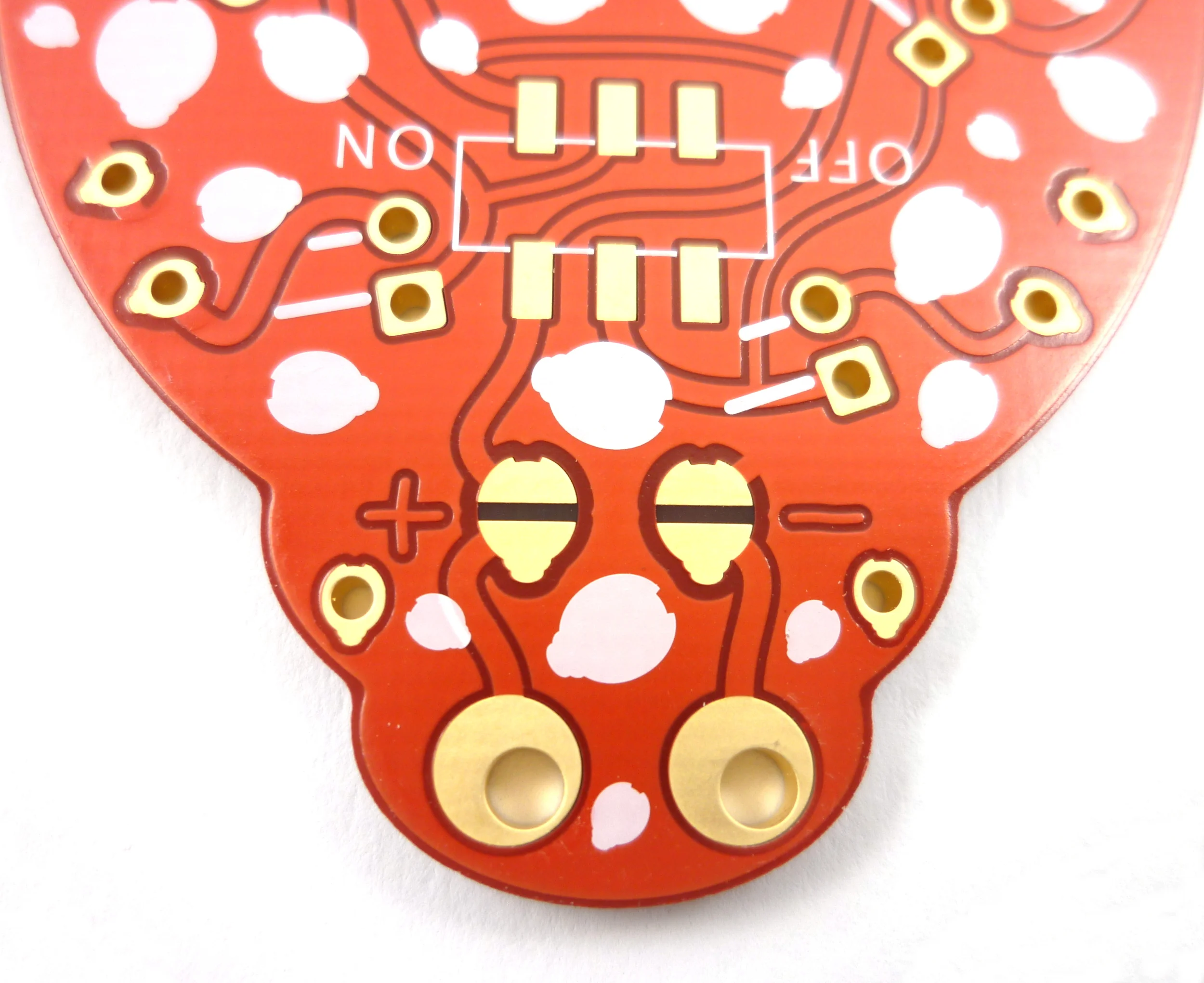 Connecting external power is possible by attaching terminals to the 'eyes' and jumping the solder bridges.
