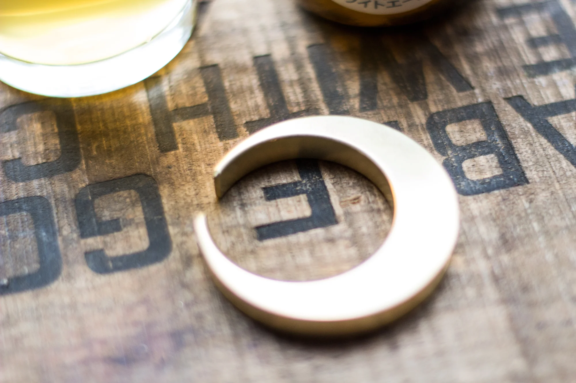 The Futagami Brass Bottle Opener in Crescent.