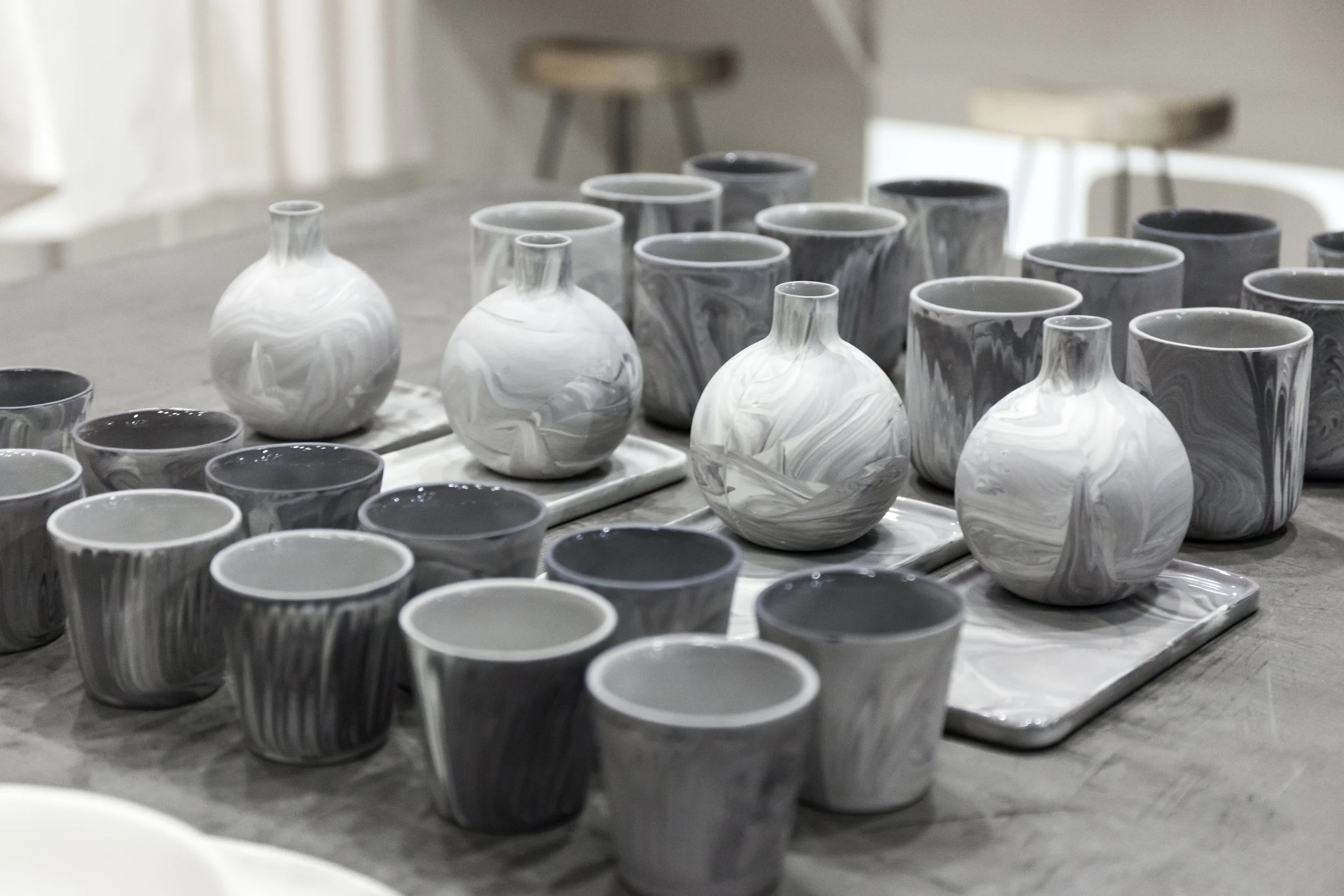 The Rikumo x Felt + Fat collection (pictured here) includes cups, tumblers, vases and decorative trays, all in Felt + Fat's signature marbled finish and a Rikumo-approved neutral palette. 