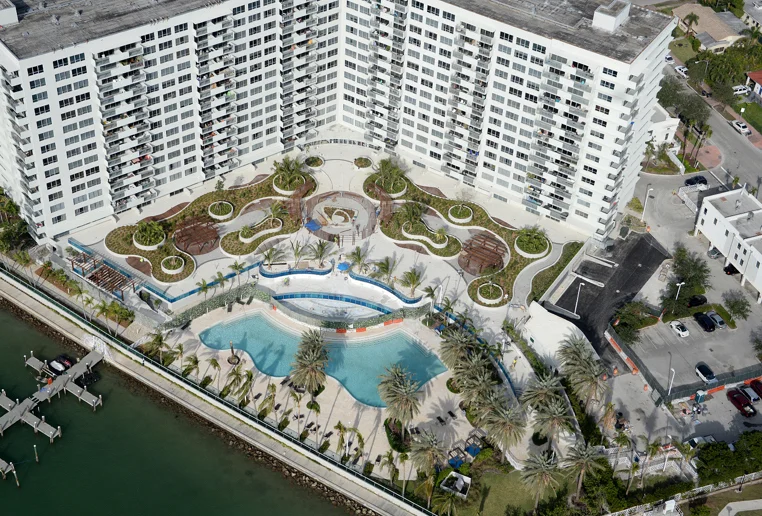  New on grade covered parking and lanai deck on the 2nd floor to include new pavers, planters, IPE benches and trellis, frameless glass railing and landscape lighting.   SF:  84,505 SF  Parking Spaces:  104 covered parking spaces  Completed Date:  No