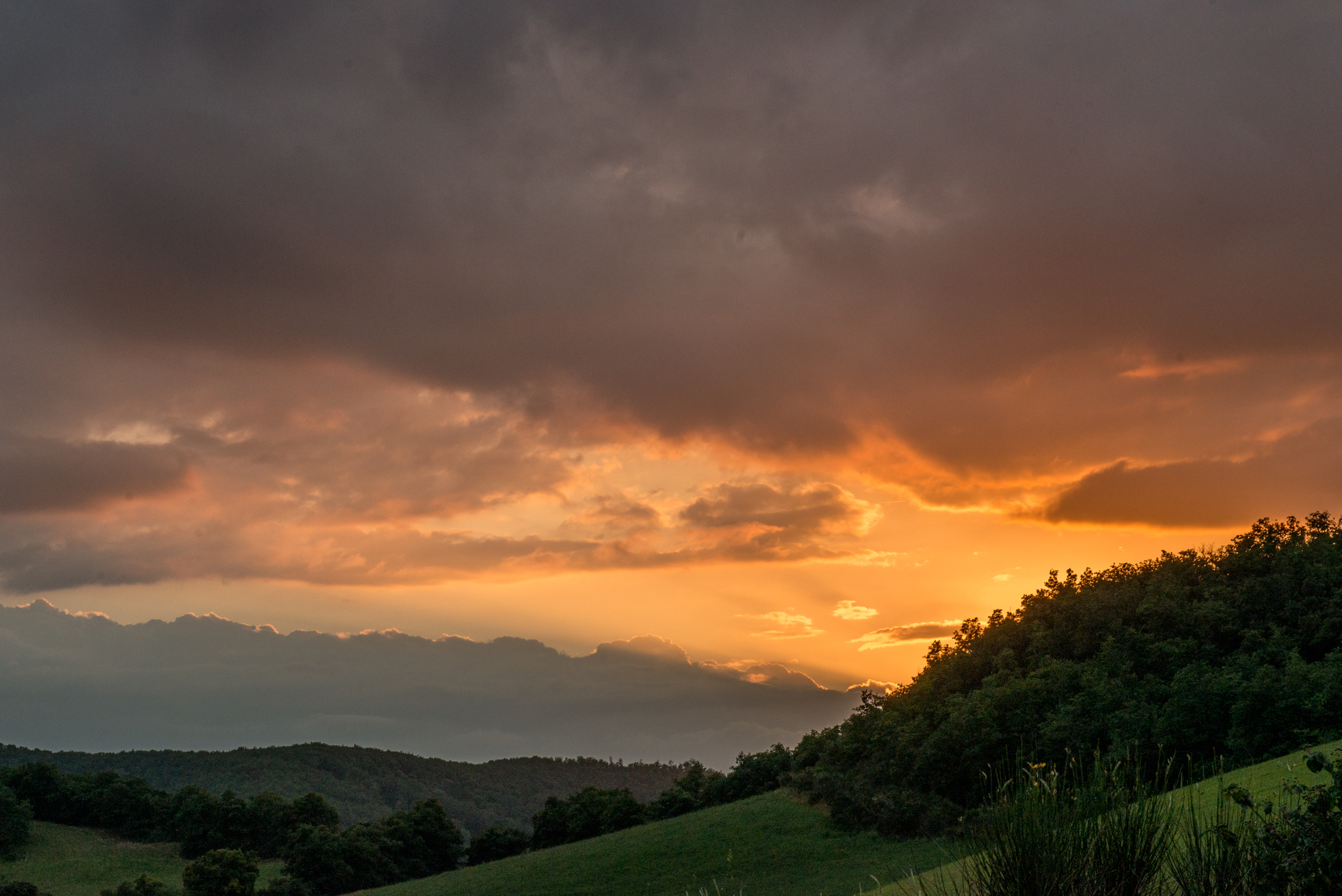 The sun began to dip below the ridge.