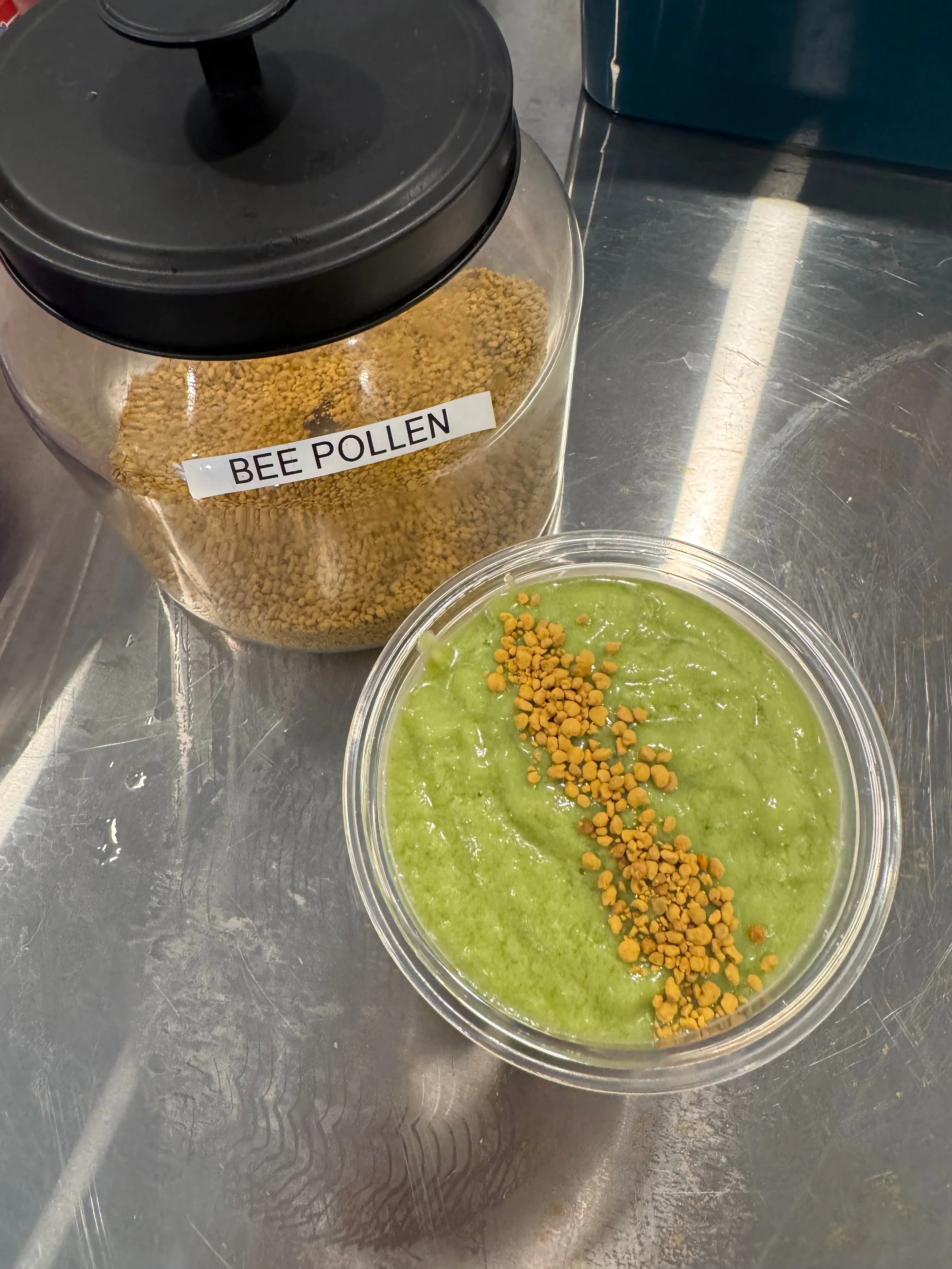 LOVE IS THE LAW - Almond Mylk + Pineapple + Avocado + Granny Smith Apples + Spinach + Lime + Georgia Honey + Comb + Dates + Bee Pollen Granules