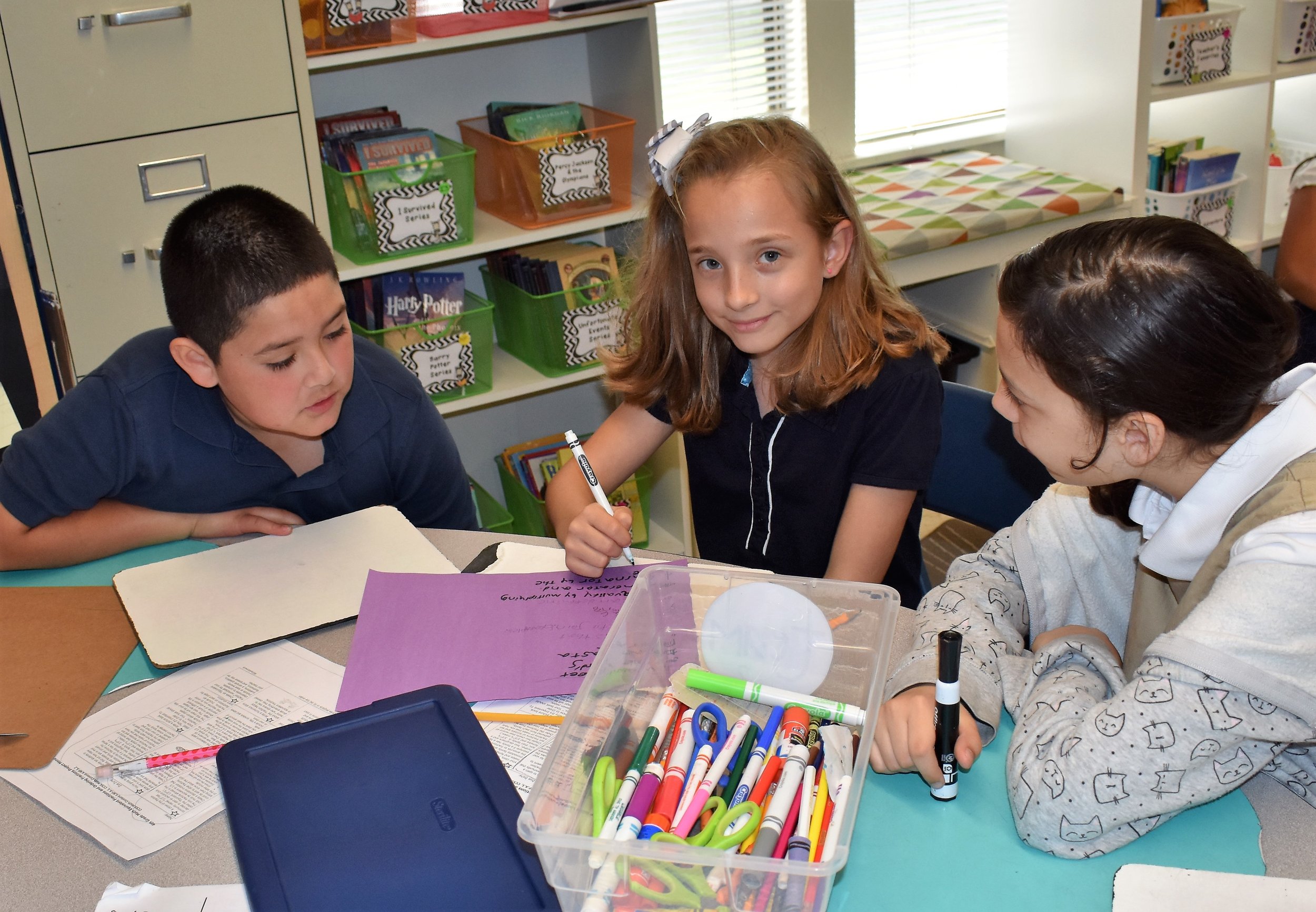 Three kids at table.jpg