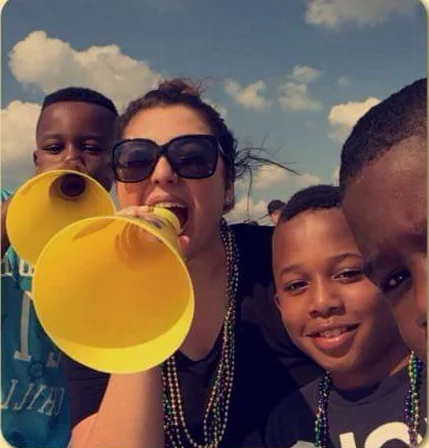 Loving on her boys!
