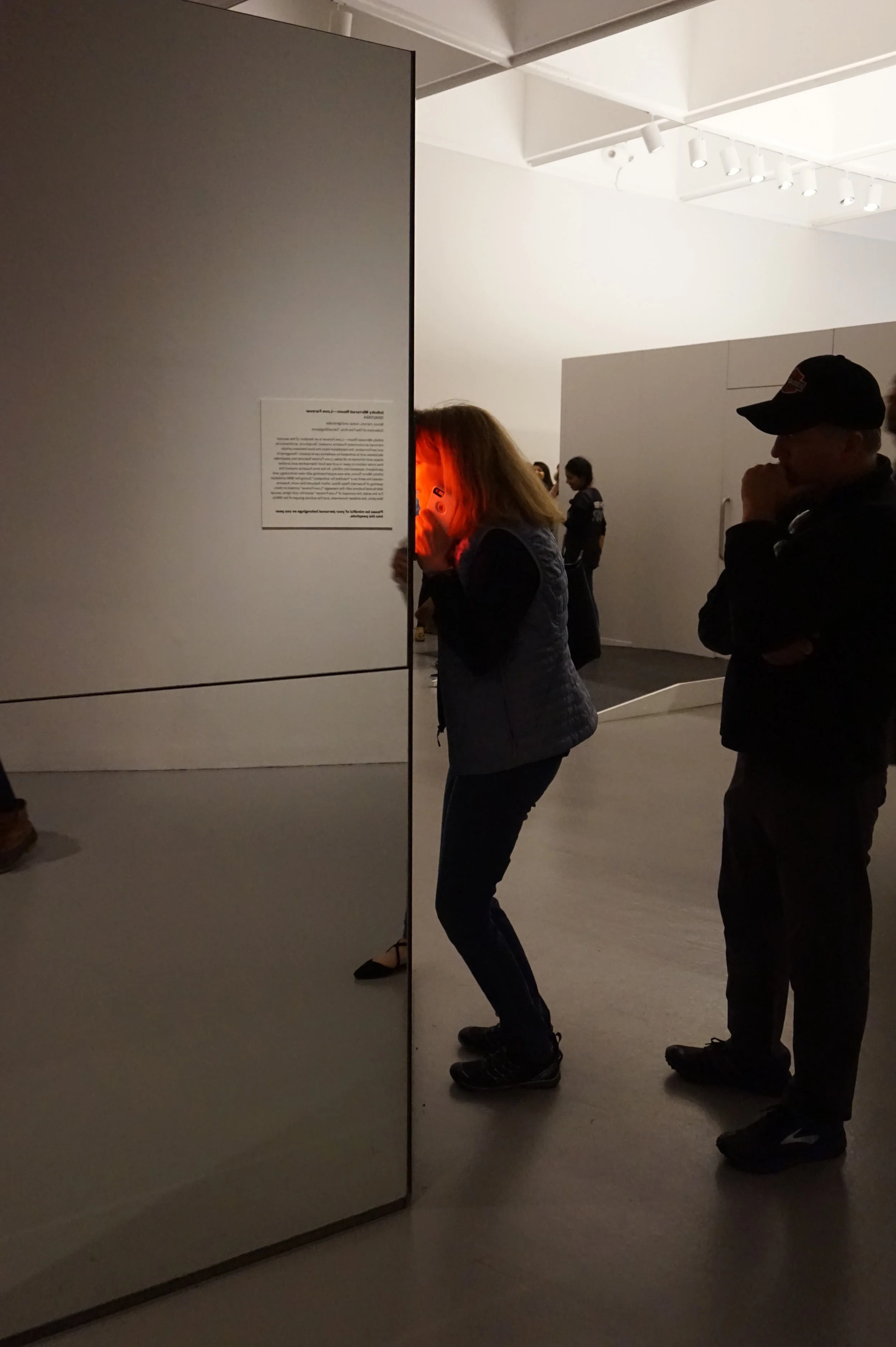 Mom and Dad peeking into the visual abyss.