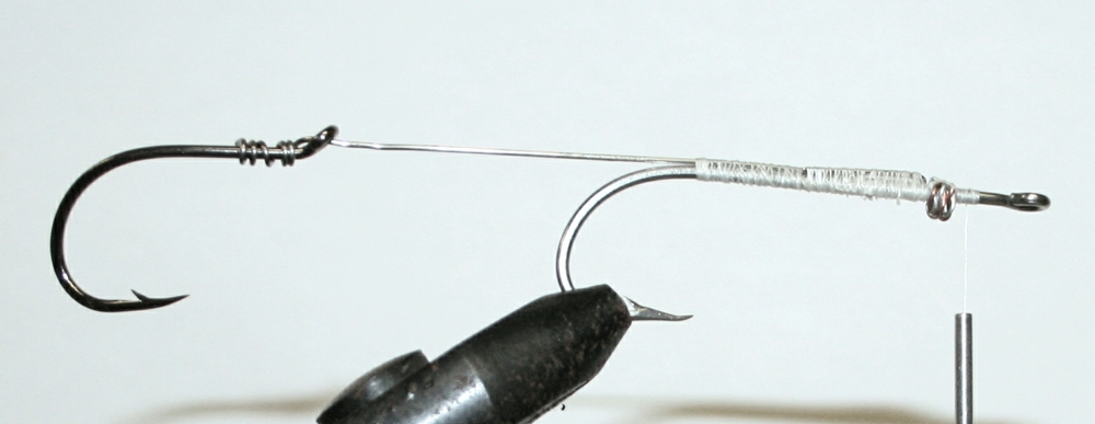 wrap trailer hook with wire then form a loop and tie into shank
Normal
0
false
false
false
EN-US
X-NONE
X-NONE
/* Style Definitions */
table.MsoNormalTable
{mso-style-name:"Table Normal";
mso-tstyle-rowband-size:0;
mso-tstyle-colband-size:0;
mso-style-noshow:yes;
mso-style-priority:99;
mso-style-parent:"";
mso-padding-alt:0in 5.4pt 0in 5.4pt;
mso-para-margin:0in;
mso-para-margin-bottom:.0001pt;
mso-pagination:widow-orphan;
font-size:10.0pt;
font-family:"Times New Roman",serif;}