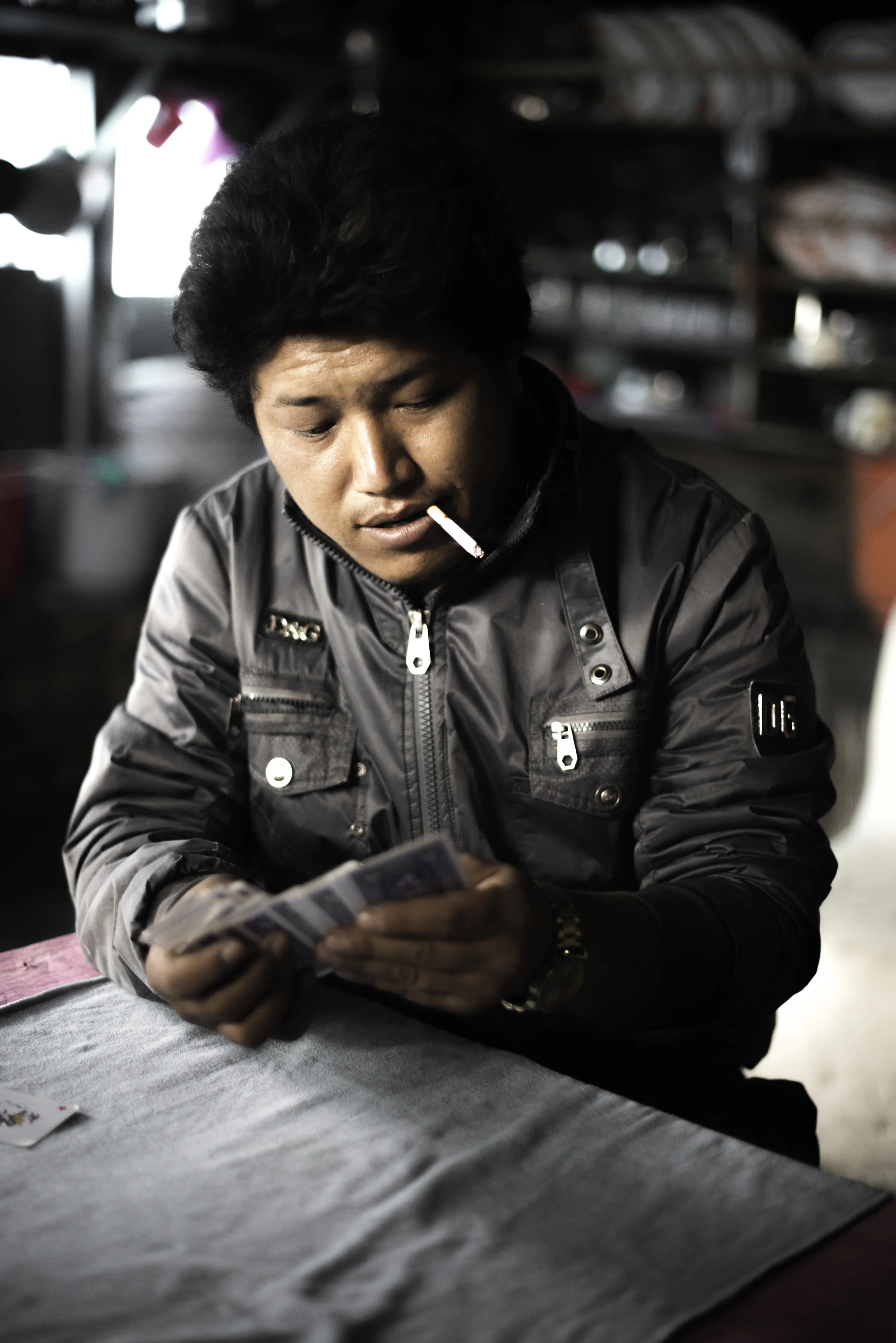   The earthquake still haunts Sherap. Now he is a key figure in the rebuilding as he hosts groups of volunteers transporting heavy building materials up the valley. He cooks them dal bhat (lentil curry) and teaches them 'falas', a gambling card game.