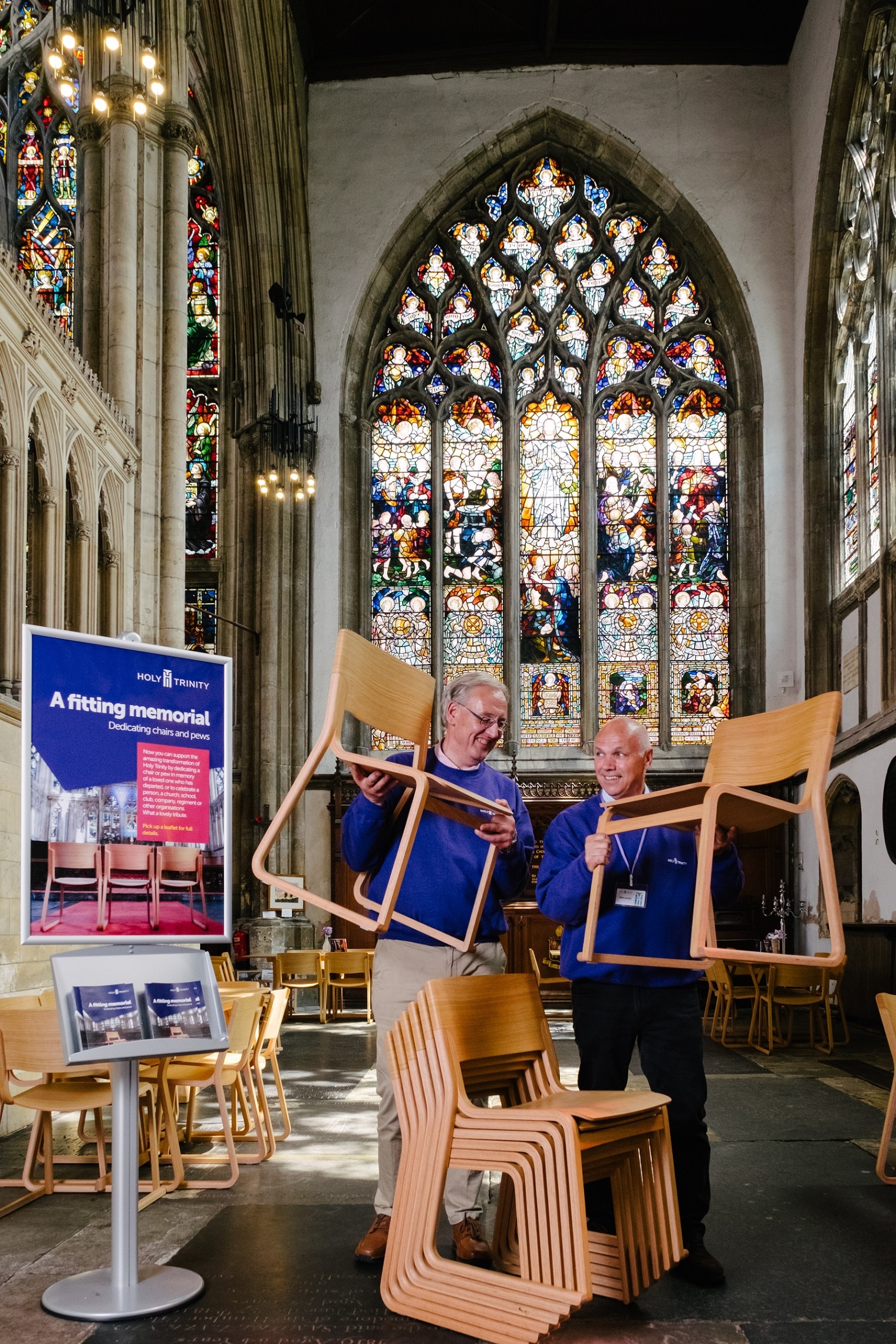 Volunteer welcomers Ray Taylor, left, and John Lawson will be encouraging visitors to Holy Trinity Church to dedicate a chair to support the transformation of the 700-year-old church.