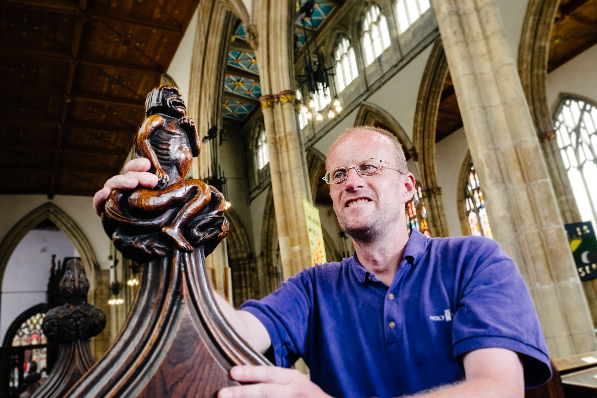 Well-wishers are also being encouraged to sponsor the Holy Trinity pews, which feature elegantly-carved ends, such as this one viewed by volunteer David Ideson.
