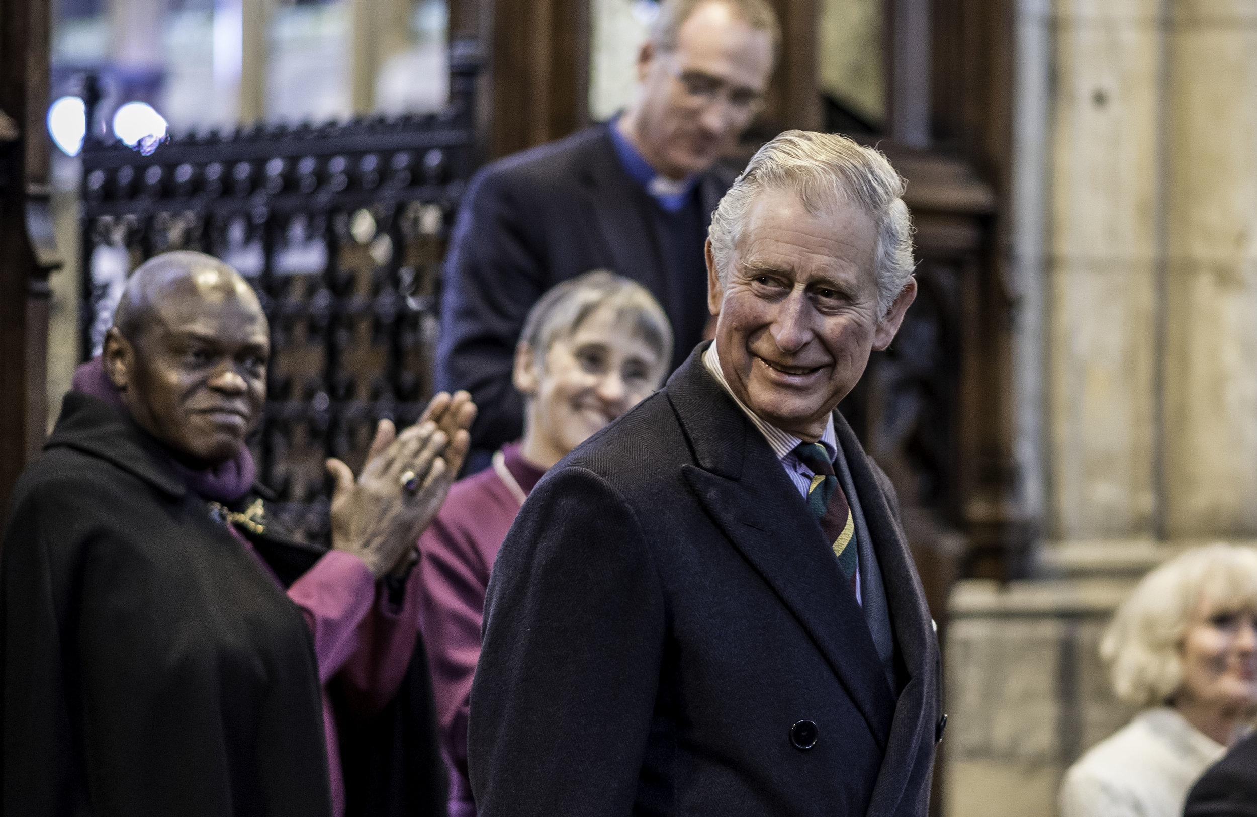 The Archbishop of York, Dr John Sentamu, leads the applause for the Prince of Wales with the Bishop of Hull, the Rt Rev Alison White, and the Vicar of Holy Trinity, the Reverend Canon Dr Neal Barnes, also showing their appreciation.