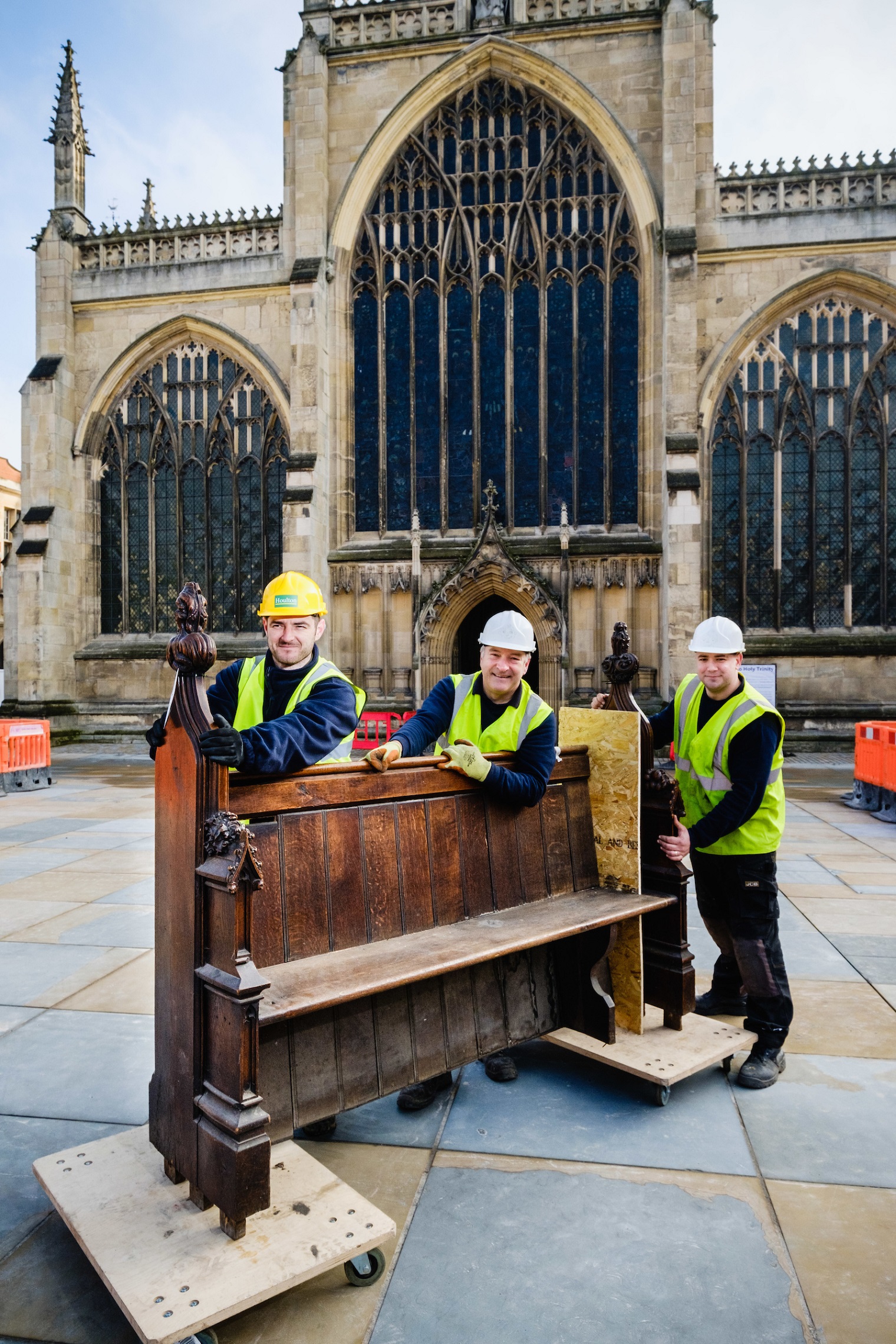 From left, workmen Mark Salter, Andrew Martindale and Andy Thompson remove the first pew as part of the internal transformation of Hull’s historic Holy Trinity Church