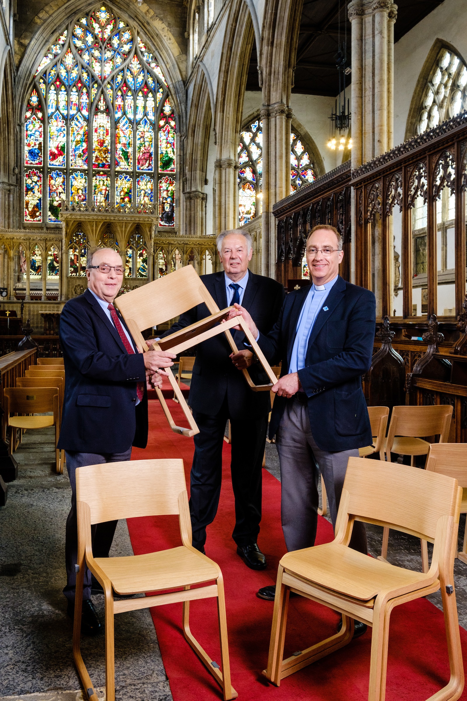 From left, Robin Mason, of the Rotary Club of Hull, Captain Dennis Robinson, of Trinity House, and the Vicar of Hull Minster, Neal Barnes, with the new chairs providing elegant and comfortable seating as part of the transformation of the magnificent church.
