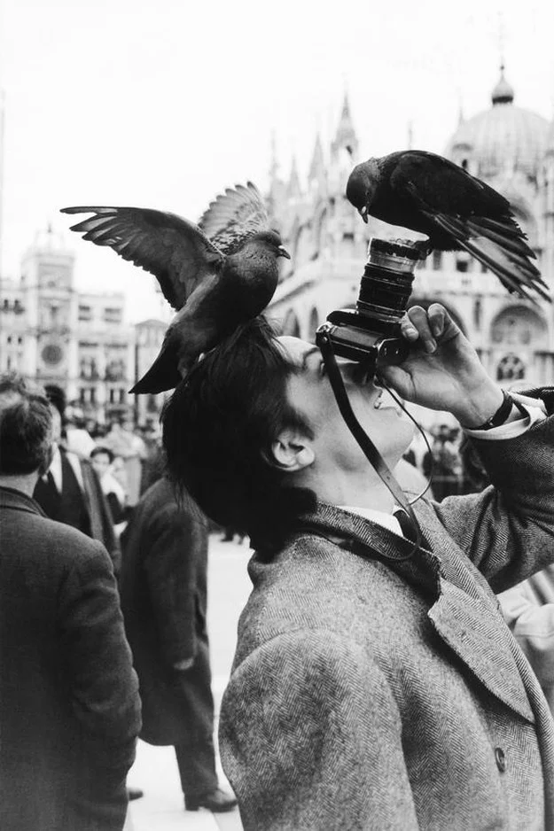 Alain Delon with rangefinder camera