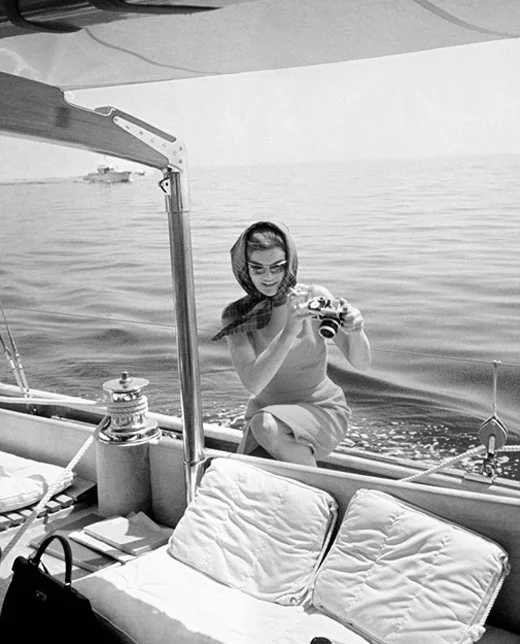 Jacqueline Kennedy Onassis with an SLR