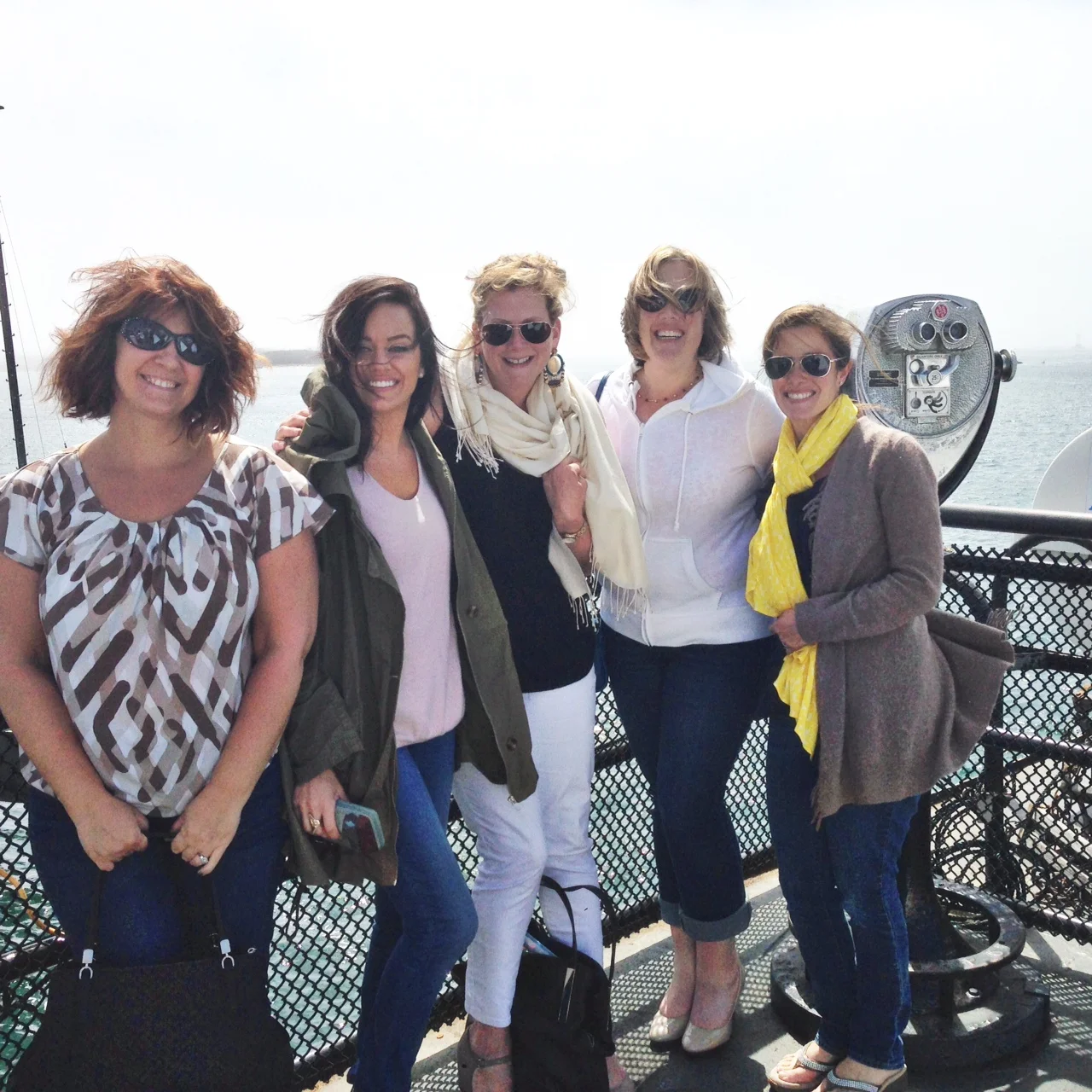 Windblown bloggers on our way to Edgartown (L-R): Shannon Entin of Traveling Mom , Liz Galvan of Liz Marie Blog , me, Nicole Wakelin of Total Fan Girl , and Danielle Driscoll of Finding Silver Pennies .