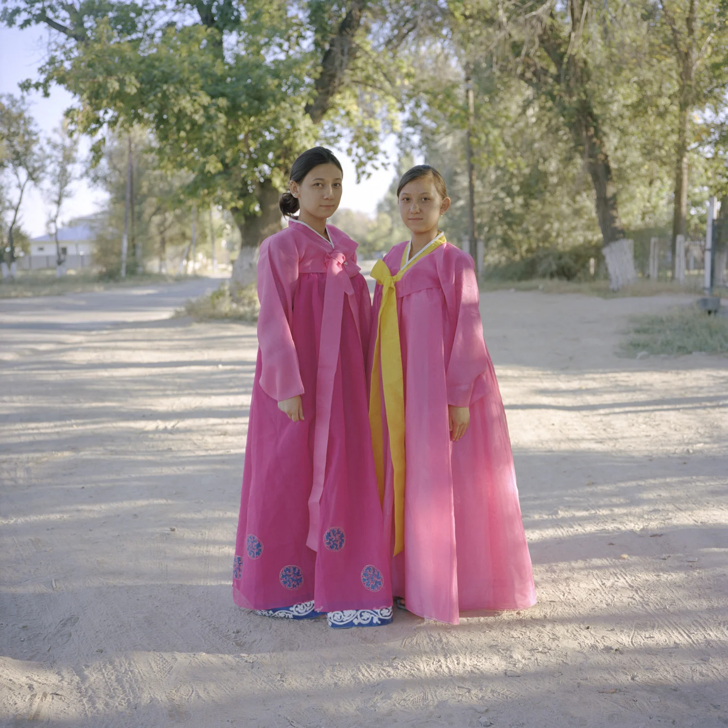 Nastya and Sveta Nam’s parents are half-Korean and half-Russian. The sisters learn Korean at a Korean church in Ushtobe and dream of studying language and traditional dance in South Korea. Ushtobe, Kazakhstan. September 2014.