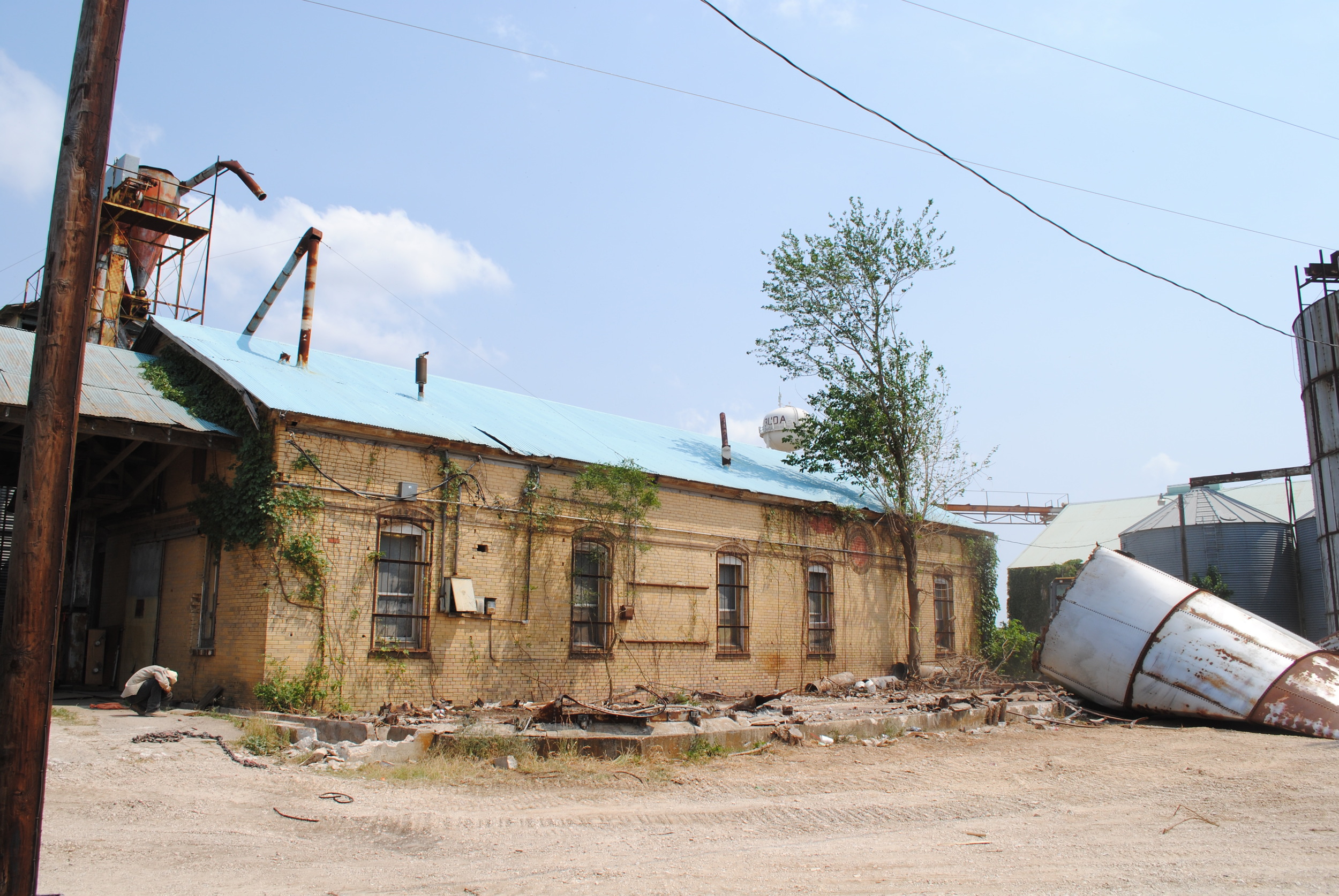 The original 1914 brick cotton gin that sat for years behind the 4 smaller silos.