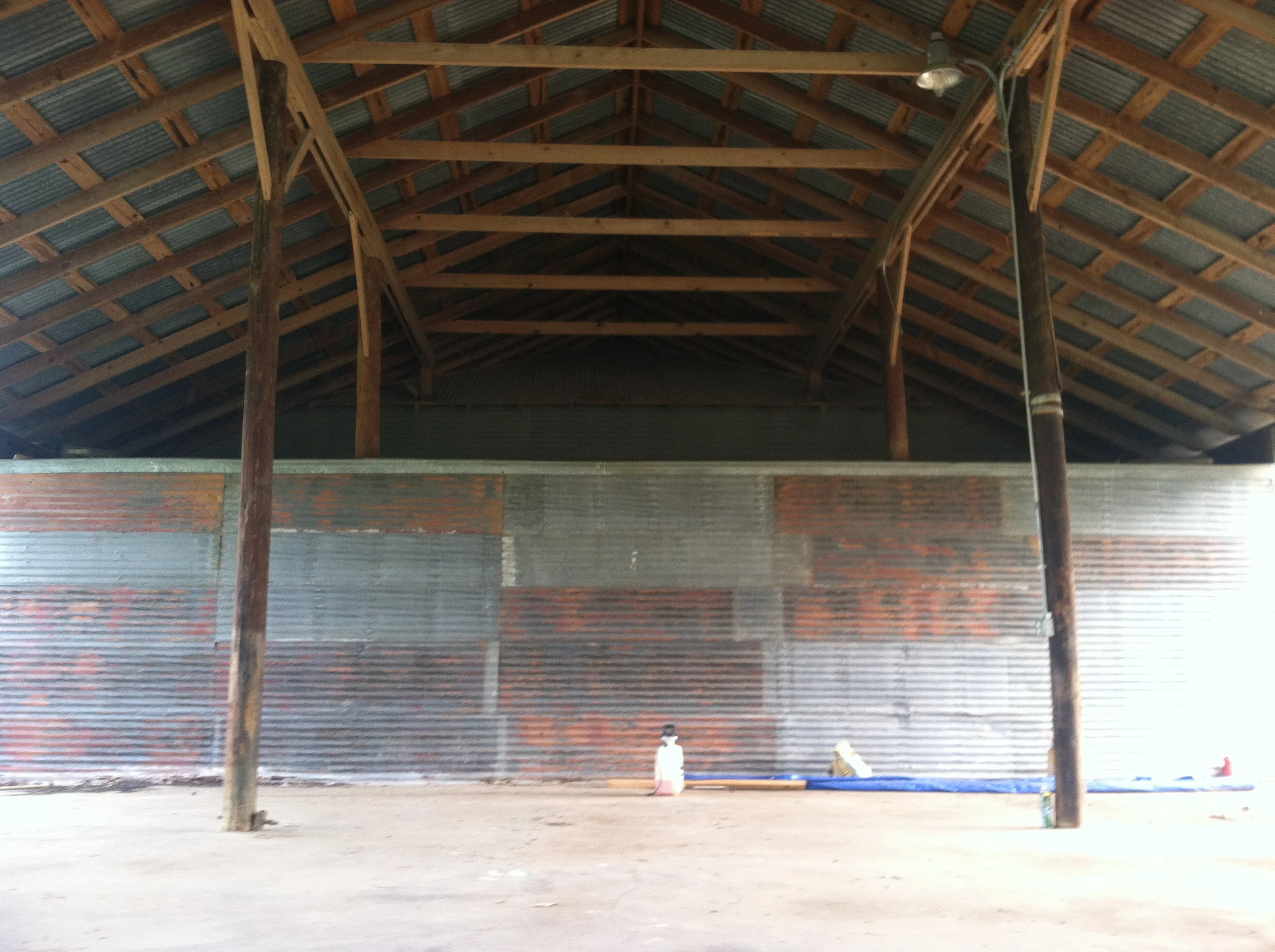 South end of the building and a look at the interior structure of the pole barn. Great texture on the old tin. And, Willie's Joint used some of the tin to make their new bar outside. It looks great. You should check it out!