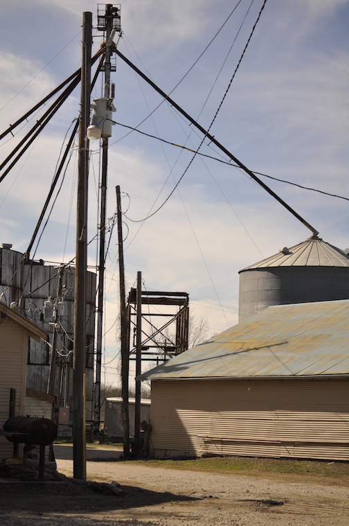 The back of the Hay barn with the old lift system still in place that was used for dumping grain. We were told that it lifted the front wheels of the truck, dumping the grain from out of the back into a large concrete subterranean tank.