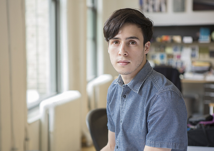 Available light photograph of James, shot for a NYC architectural firm. 70mm lens, f2.81/125th sec, ISO 640