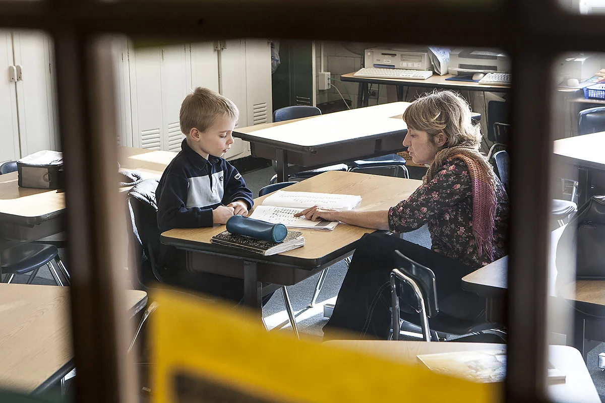 teacher helping student.jpg