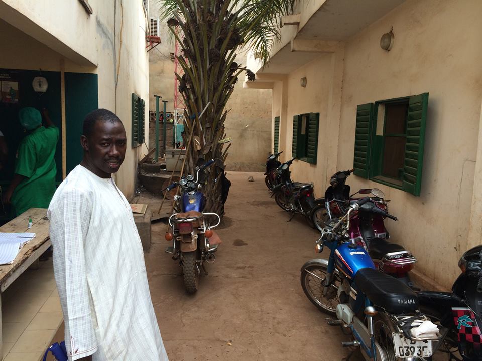 Karamoko in the internal courtyard of the clinic - shrinking as the clinic grows.