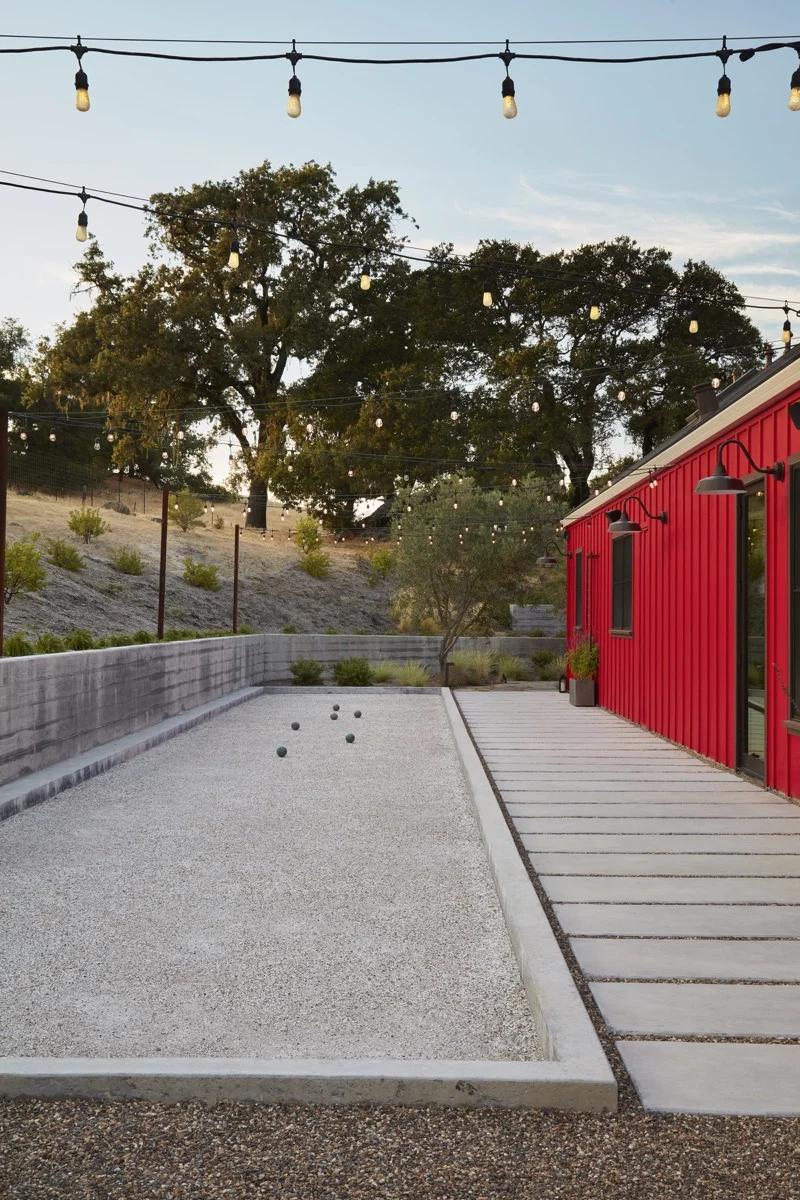 Copy of A bocce ball court is nestled into the hillside and provides space for play.